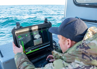 A sailor conducts a search for debris with an underwater vehicle during recovery efforts of a high altitude balloon in the Atlantic Ocean, Feb. 7, 2023.