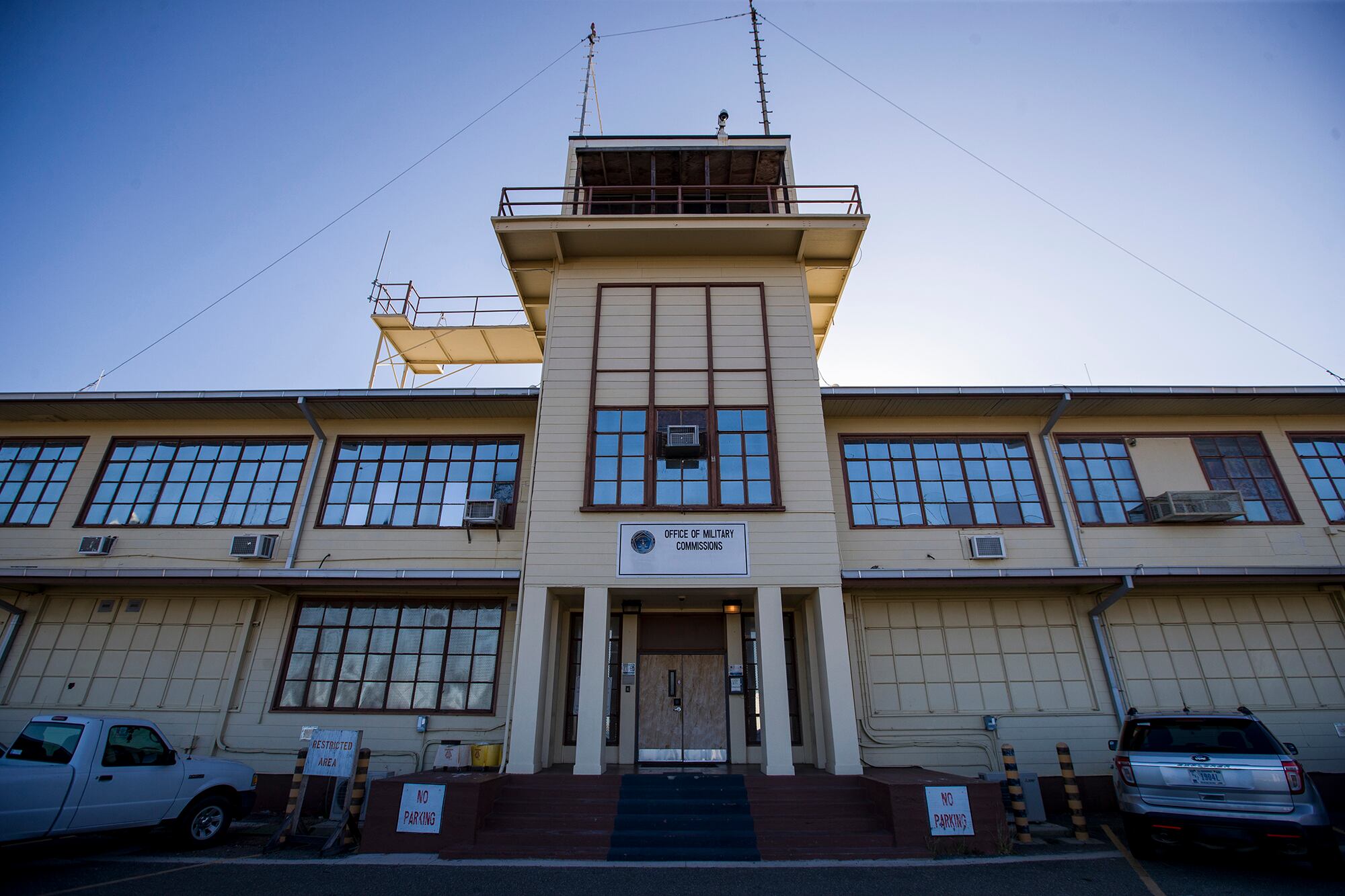 In this photo reviewed by U.S. military officials, the Office of Military Commissions building used for Periodic Review Board hearings is seen April 18, 2019, in Guantanamo Bay Naval Base, Cuba.