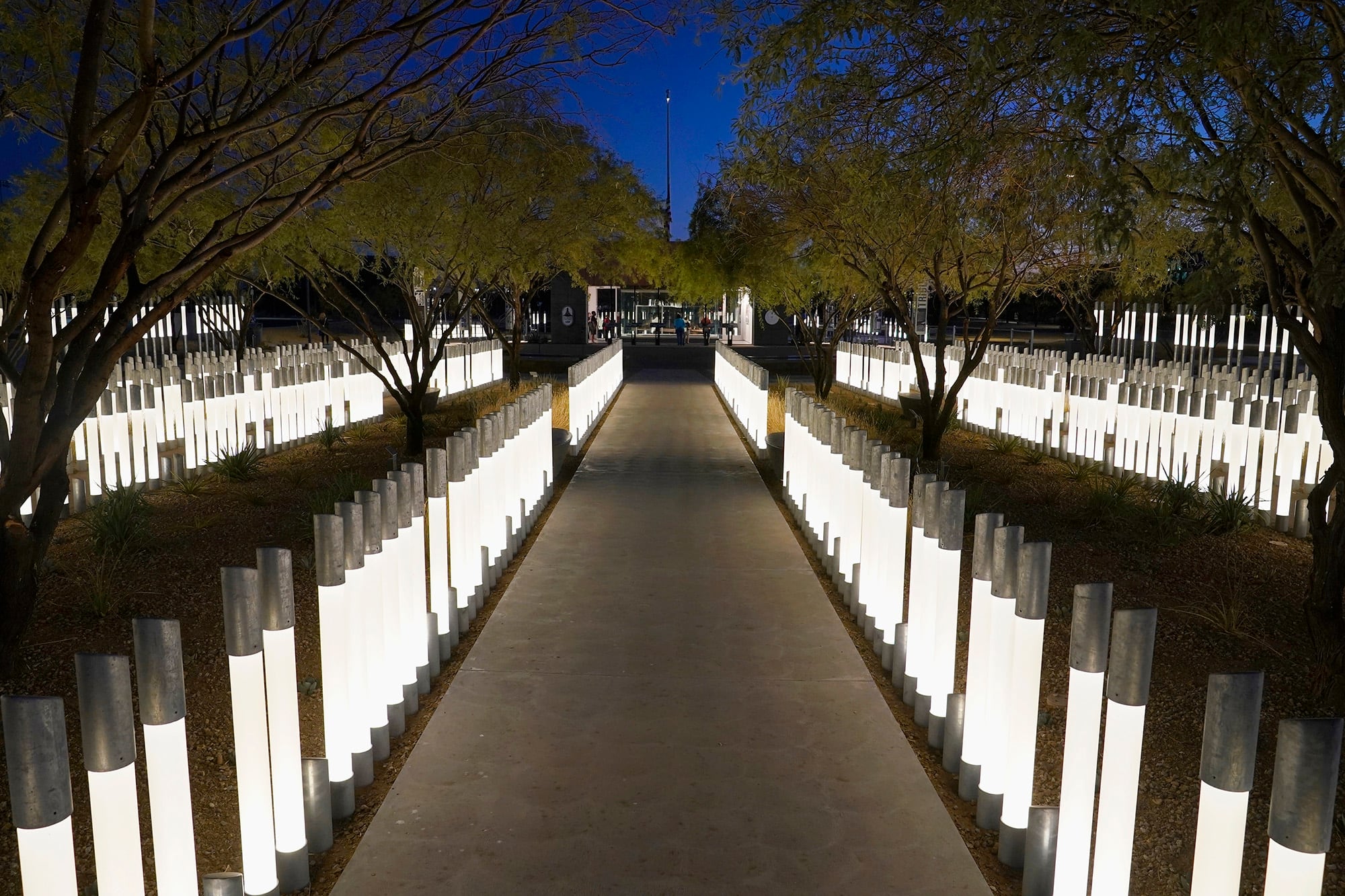 Some of the 1,500 columns, many illuminated, highlight the Salt River Pima-Maricopa Indian Community memorial tribute on Nov. 11, 2020, Veterans Day, in Scottsdale, Ariz.