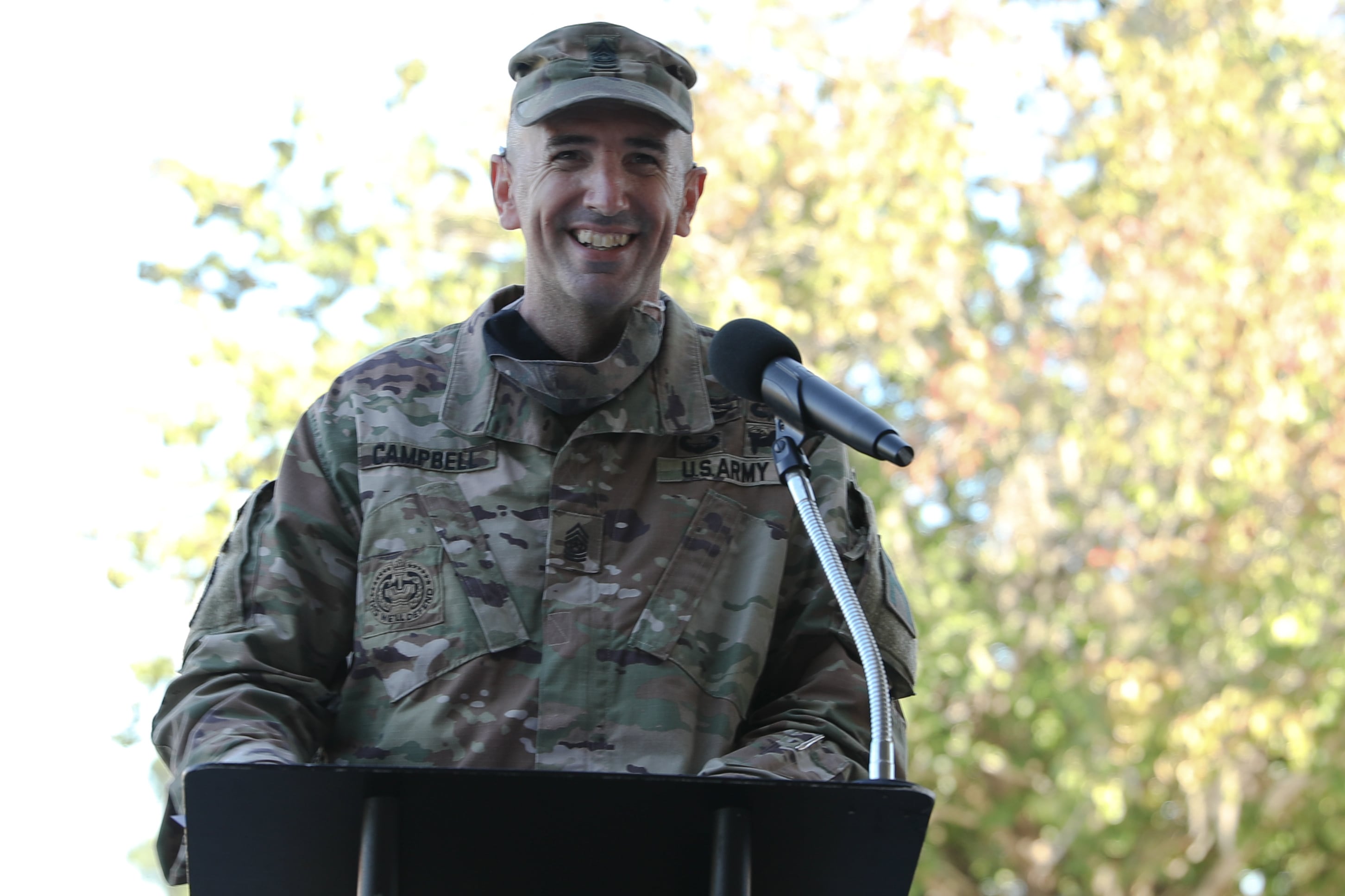 Command Sgt. Maj. Thomas E. Campbell smiles during his farewell speech at a change-of-responsibility ceremony Sept. 30, 2020, at Fort Stewart, Georgia.