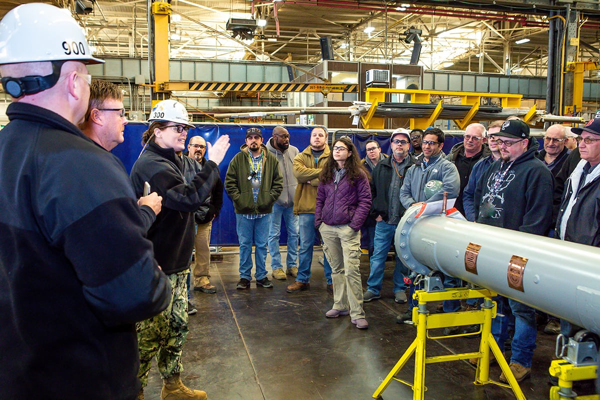 Capt. Dianna Wolfson addresses the minesweeper condenser building team