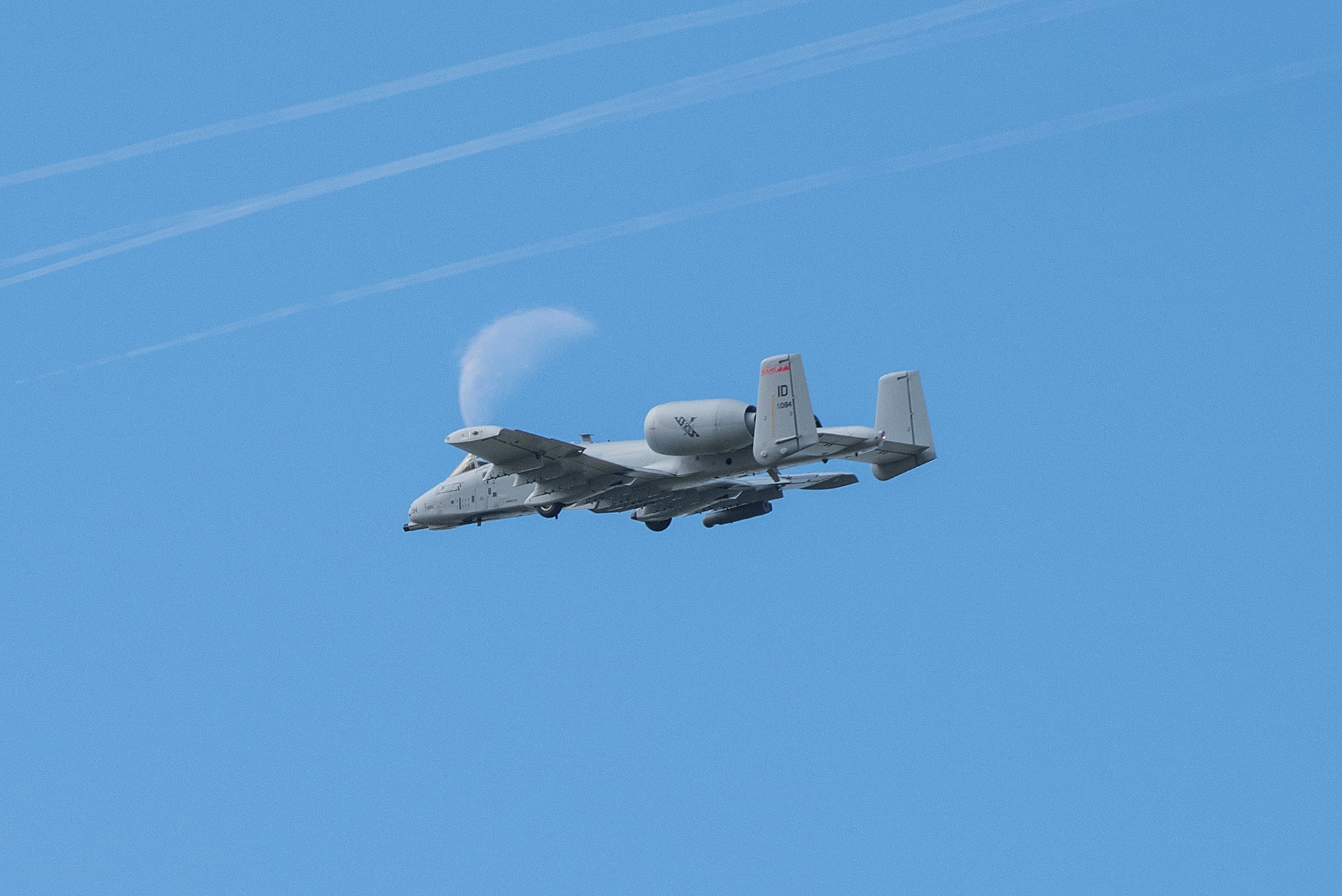 The moon snuck in this shot as two 124th Fighter Wing A-10 Thunderbolt IIs linked up with two F-15E Strike Eagles from Mountain Home Air Force Base on May 15, 2020, for a flyover throughout cities of Idaho to honor essential workers and show appreciation to the sacrifice, commitment and bravery of all Idaho's essential workers and citizens keeping Idaho running during this challenging time with the COVID-19 pandemic.