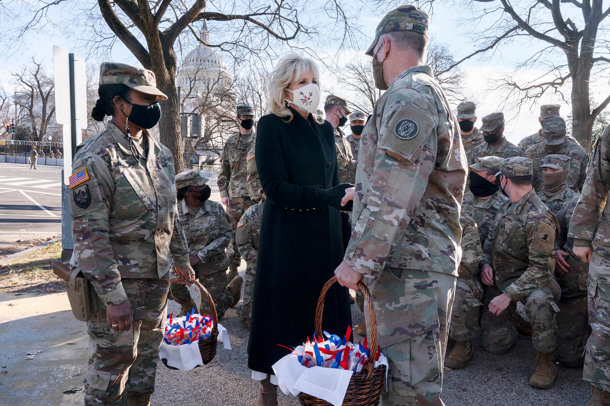 Saying, "The Biden's are a National Guard family," first lady Jill Biden greets members of the National Guard with chocolate chip cookies Jan. 22, 2021, at the U.S. Capitol in Washington.