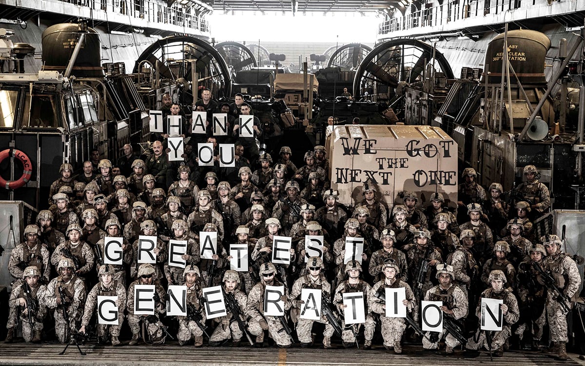 Sailors and Marines pose for a photo in a landing craft, air cushion in the well deck aboard the Wasp-class amphibious assault ship USS Kearsarge (LHD 3) on June 2, 2019, in commemoration of the 75th anniversary of Operation Neptune, the amphibious landing on the beaches in Normandy, France on D-Day, June 6, 1944.