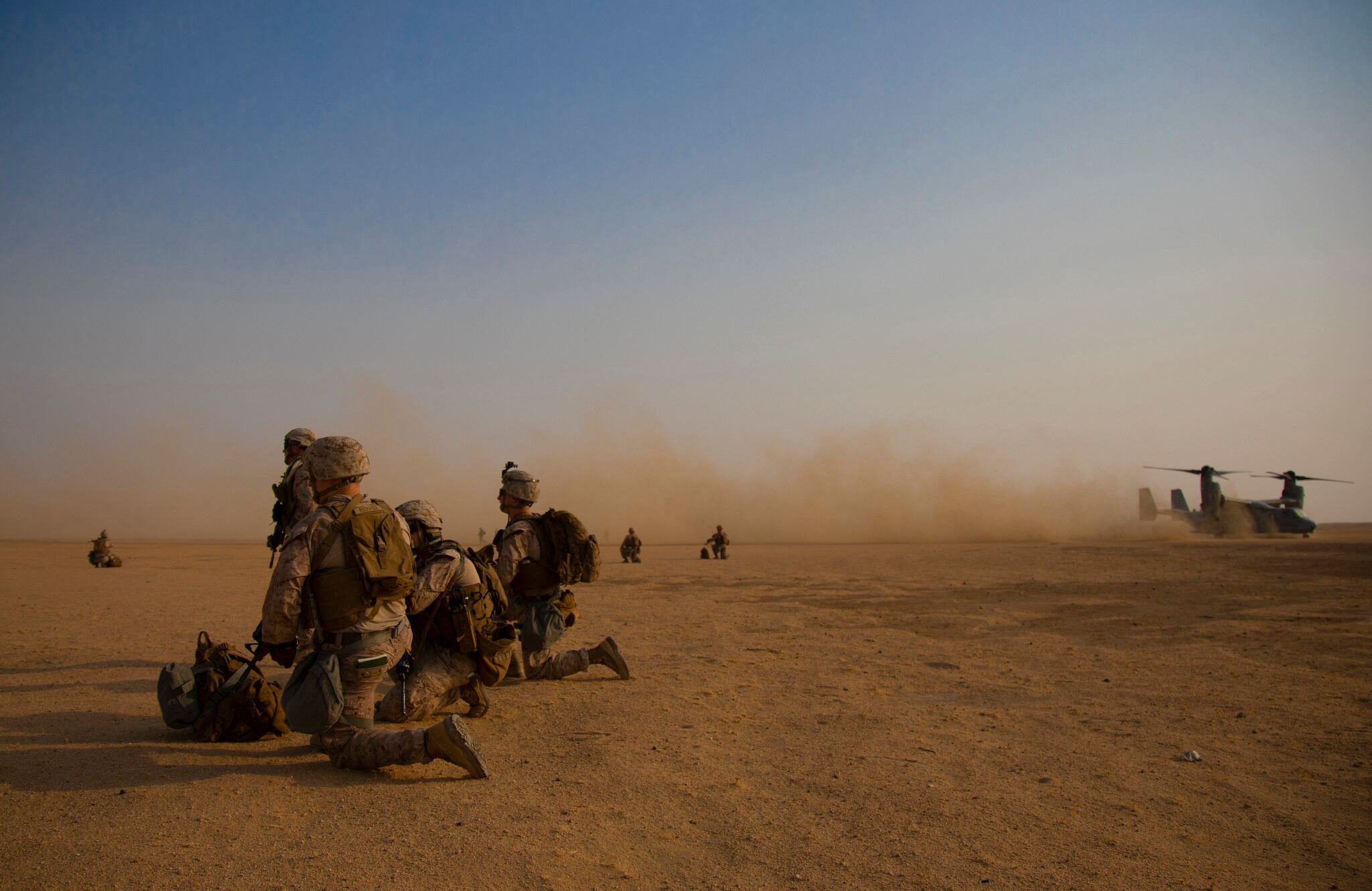 U.S. Marines with 1st Battalion, 7th Marine Regiment, attached to Special Purpose Marine Air-Ground Task Force Crisis Response-Central Command, post security during a tactical recovery of aircraft and personnel exercise at Camp Buehring, Kuwait, Aug. 7, 2019.