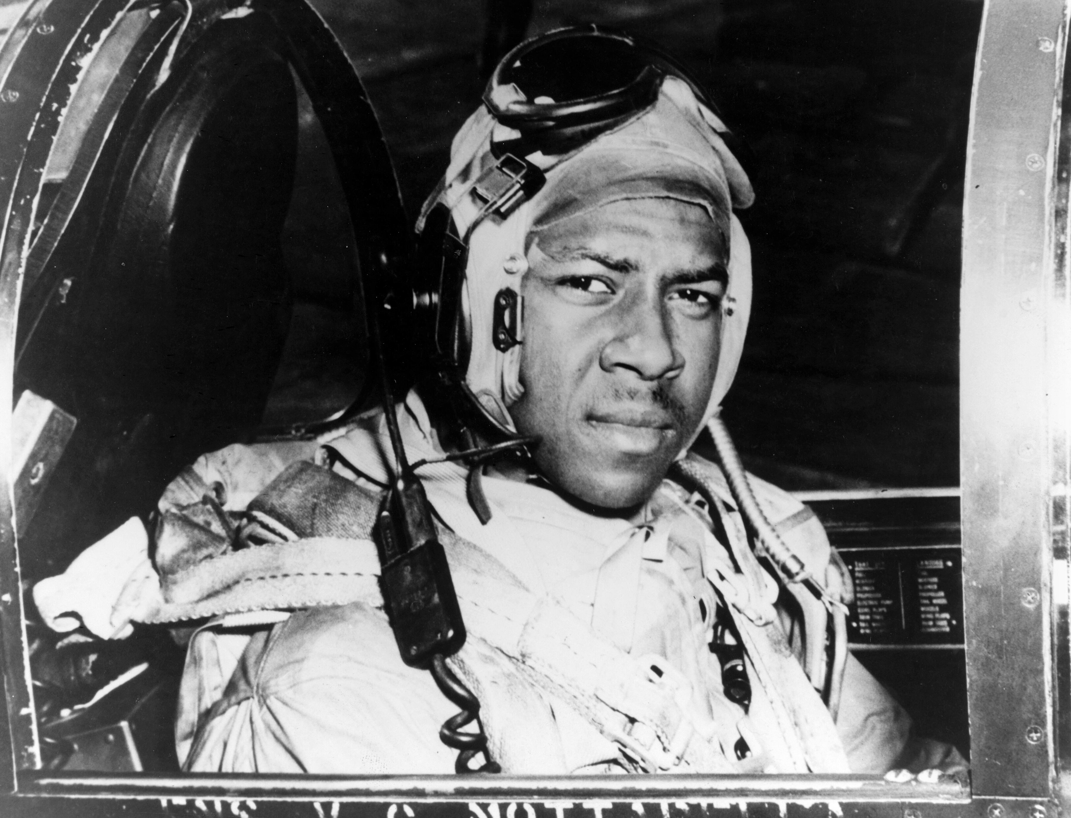 This circa 1950 photo provided by the U.S. Navy shows Jesse Brown in the cockpit of an F4U-4 Corsair fighter at an unidentified location.