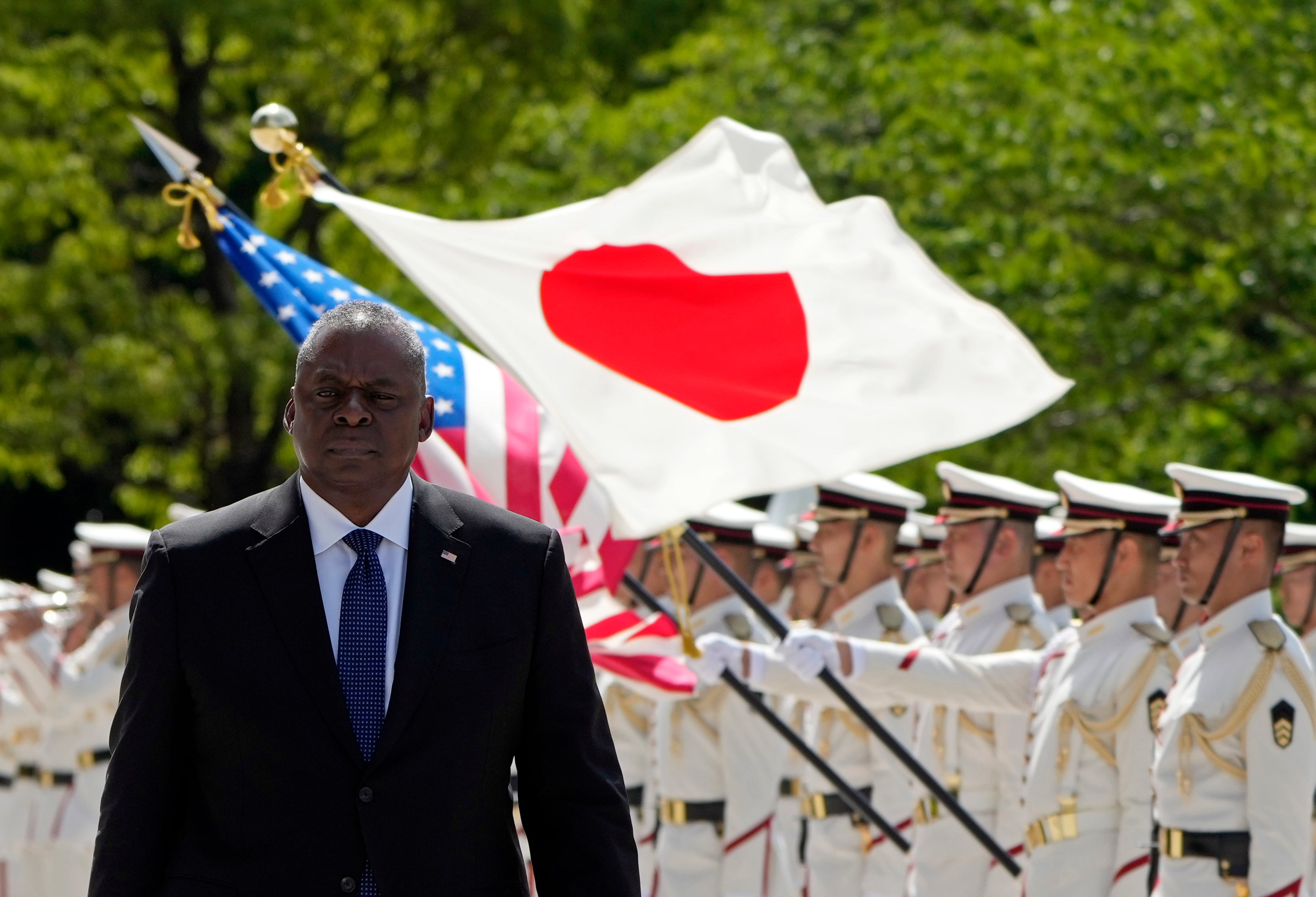 U.S. Defense Secretary Lloyd Austin reviews the guard of honor at the Defense Ministry in Tokyo Thursday, June 1, 2023.