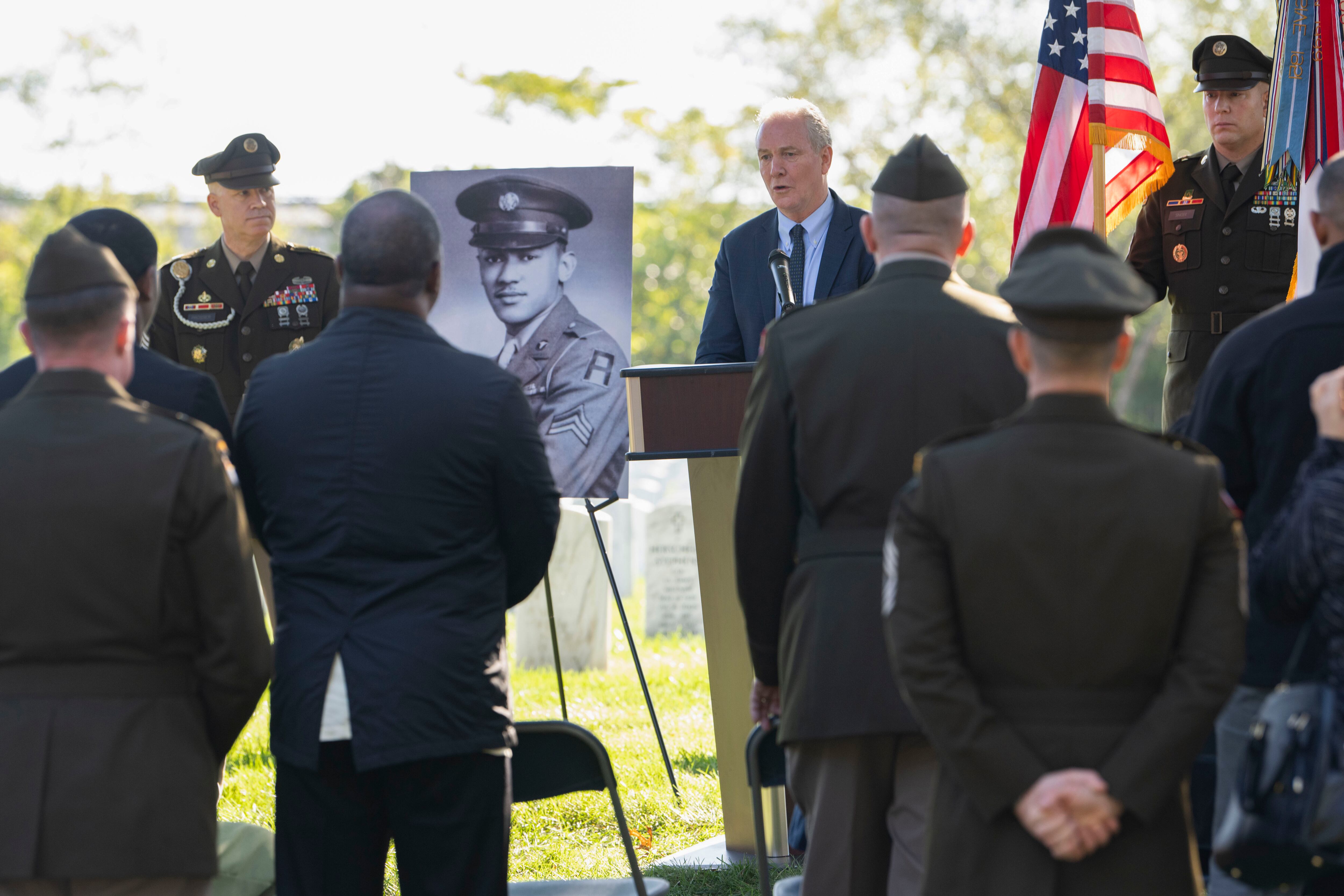 Sen. Chris Van Hollen, D-Md., speaks during a medal ceremony for Cpl. Waverly B. Woodson Jr., to be posthumously honored with the Bronze Star and Combat Medic Badge at Arlington National Cemetery on Tuesday, Oct. 11, 2023 in Arlington, Va.