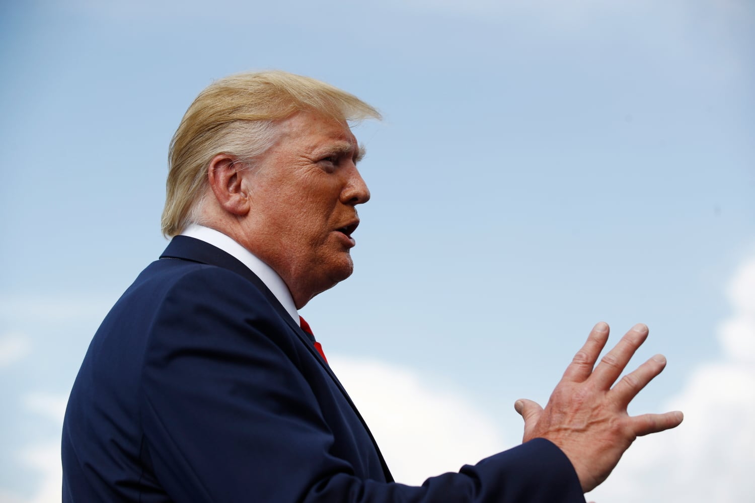 President Donald Trump and first lady Melania Trump board Air Force One at Morristown Municipal Airport in Morristown, N.J., Sunday, Aug. 18, 2019, en route to Andrews Air Force Base, Md.