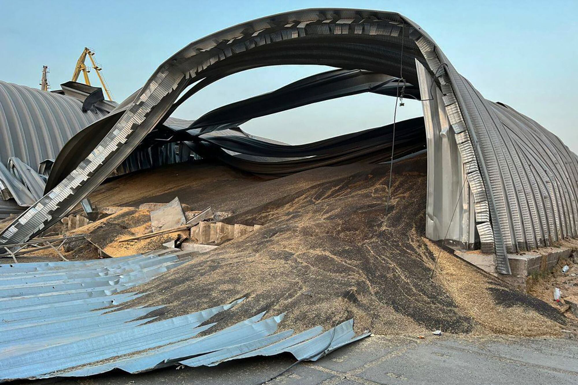 In this photo provided by the Odesa Regional Administration Press Office, a granary destroyed in a Russian drone attack at night is seen in a Danube port near Odesa, Ukraine, early hours Wednesday, Aug. 16, 2023.