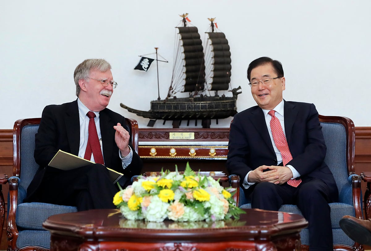 U.S. National Security Adviser John Bolton, left, talks with South Korean National Security Adviser Chung Eui-yong during a meeting at the presidential Blue House in Seoul, South Korea, Wednesday, July 24, 2019.