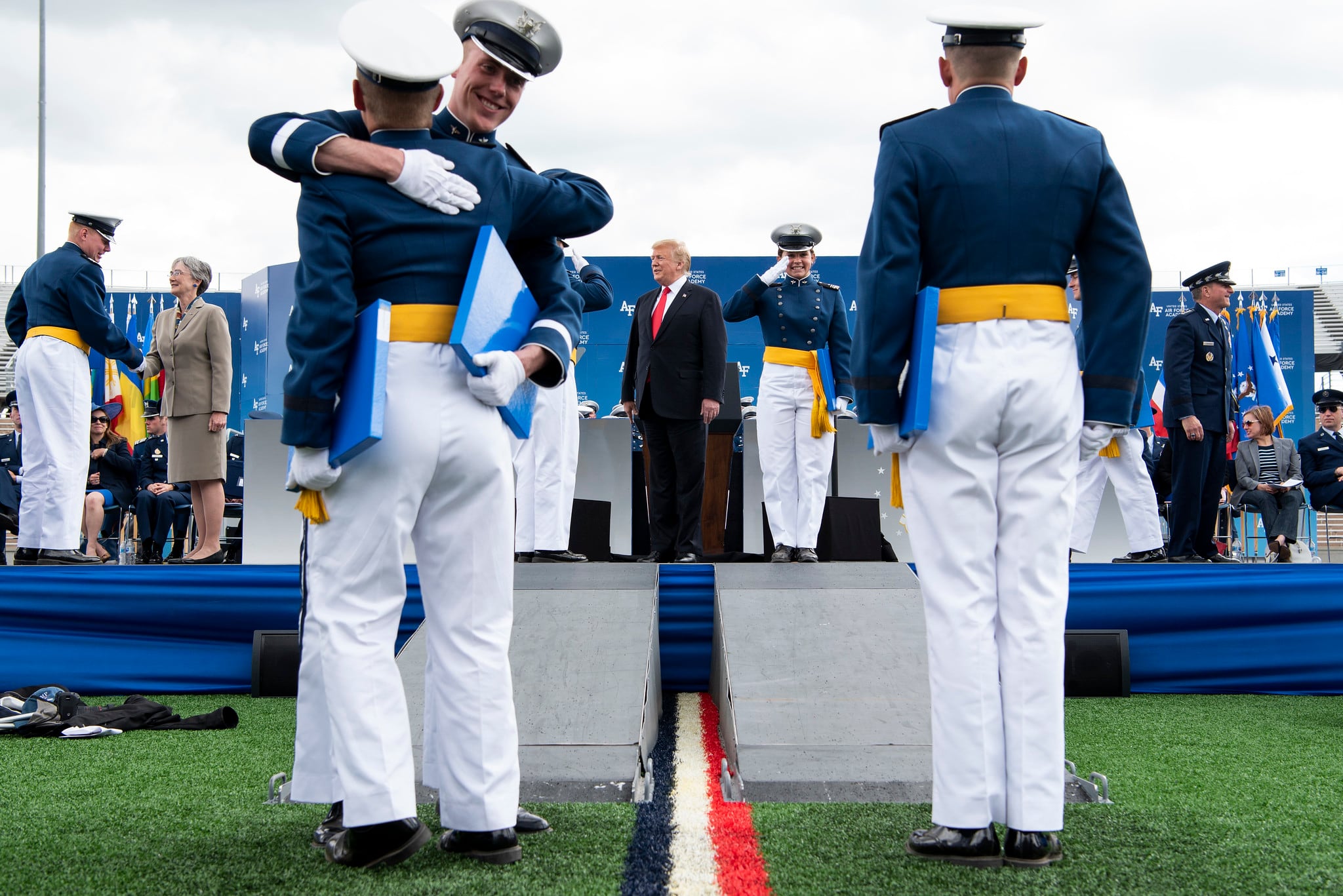 President Donald Trump congratulates cadets at the U.S. Air Force Academy graduation at Falcon Stadium in Colorado Springs, Colo.