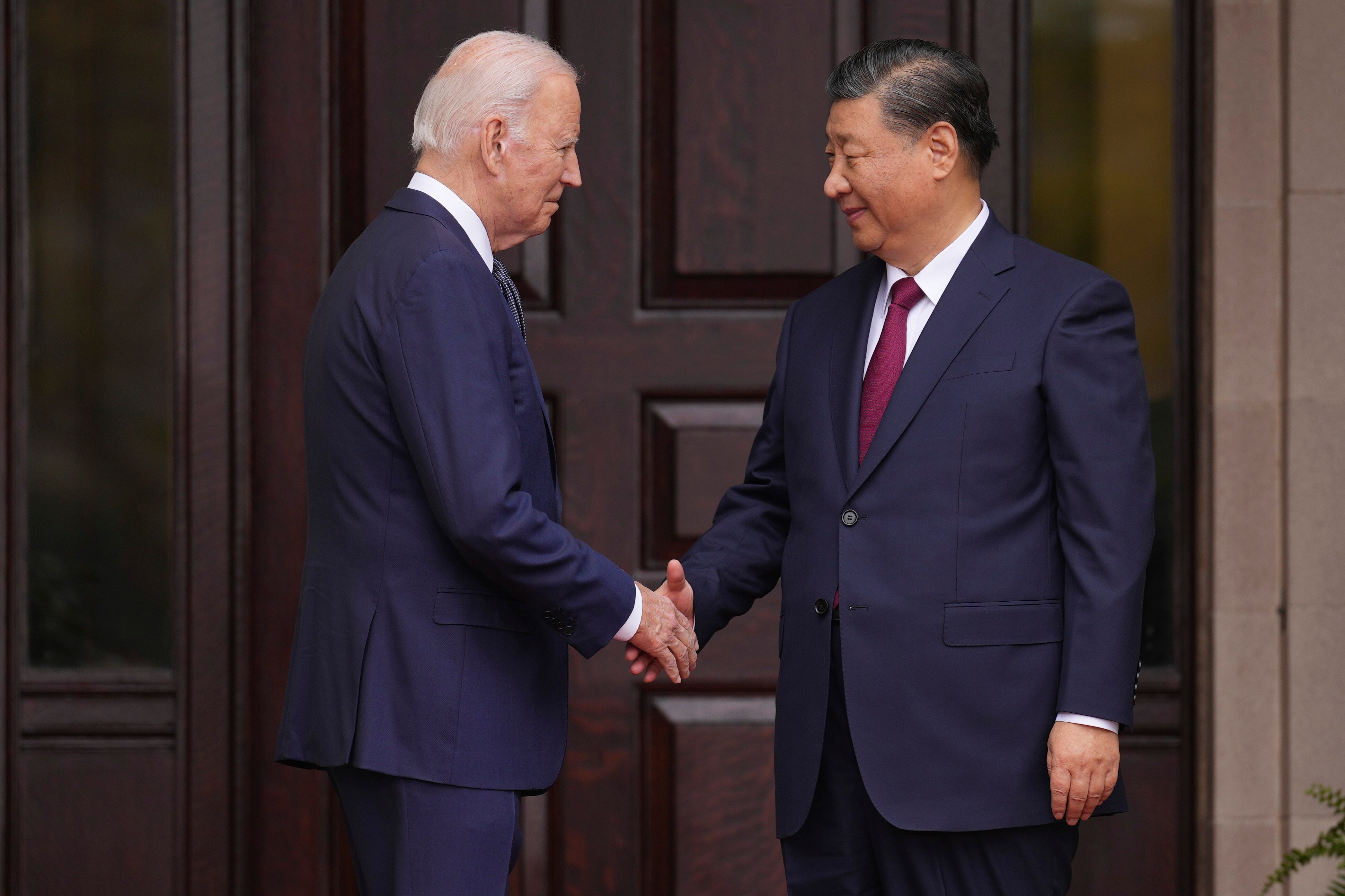 President Joe Biden greets China's President President Xi Jinping at the Filoli Estate in Woodside, Calif., Wednesday, Nov, 15, 2023, on the sidelines of the Asia-Pacific Economic Cooperative conference.