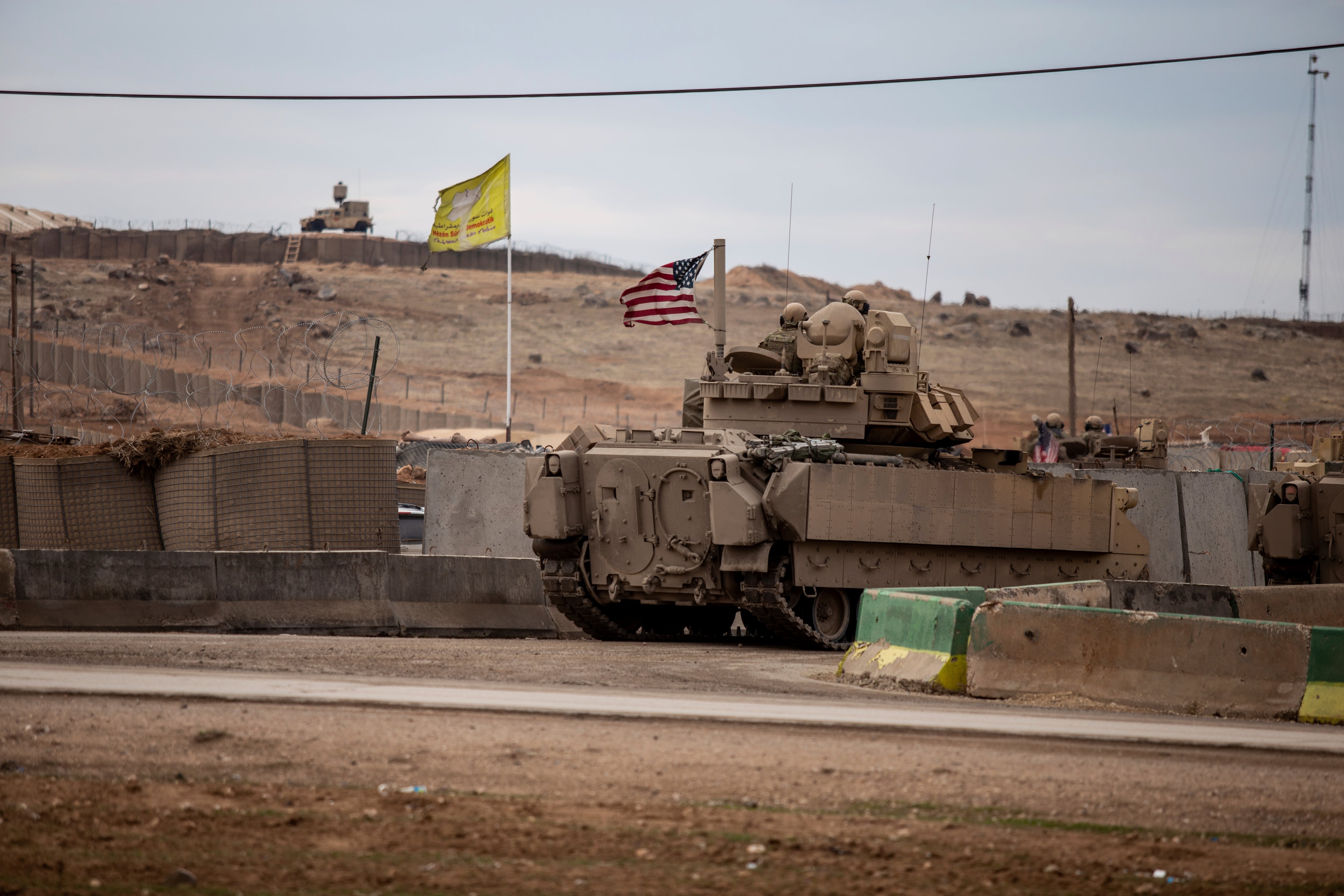 American soldiers patrol near prison that was attacked on Jan. 20 by the Islamic State militants in Hassakeh, Syria, Feb. 8, 2022.