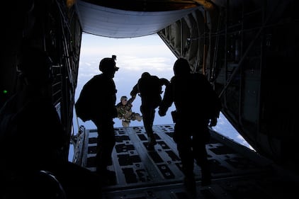 Marines conduct parachute training operations over Marine Corps Air Station Kaneohe Bay, Marine Corps Base Hawaii, July 19, 2019.